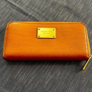 Michael Kors zip around wallet. Genuine leather.